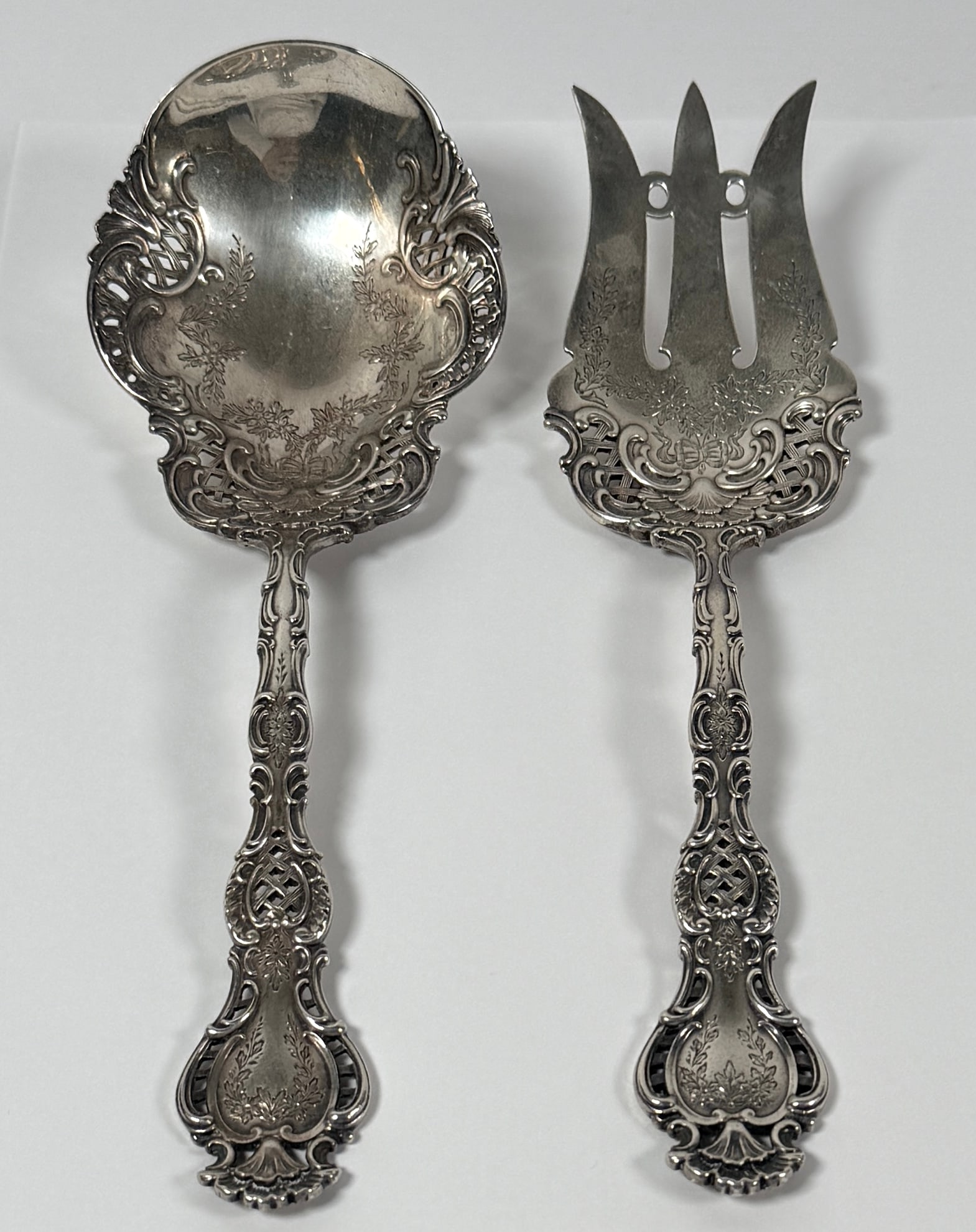 STERLING SILVER SALAD FORK AND SPOON SET: MARKED J.E. CALDWELL & CO., MARKED STERLING. 310 GRAMS IN TOTAL WEIGHT. 9.5"