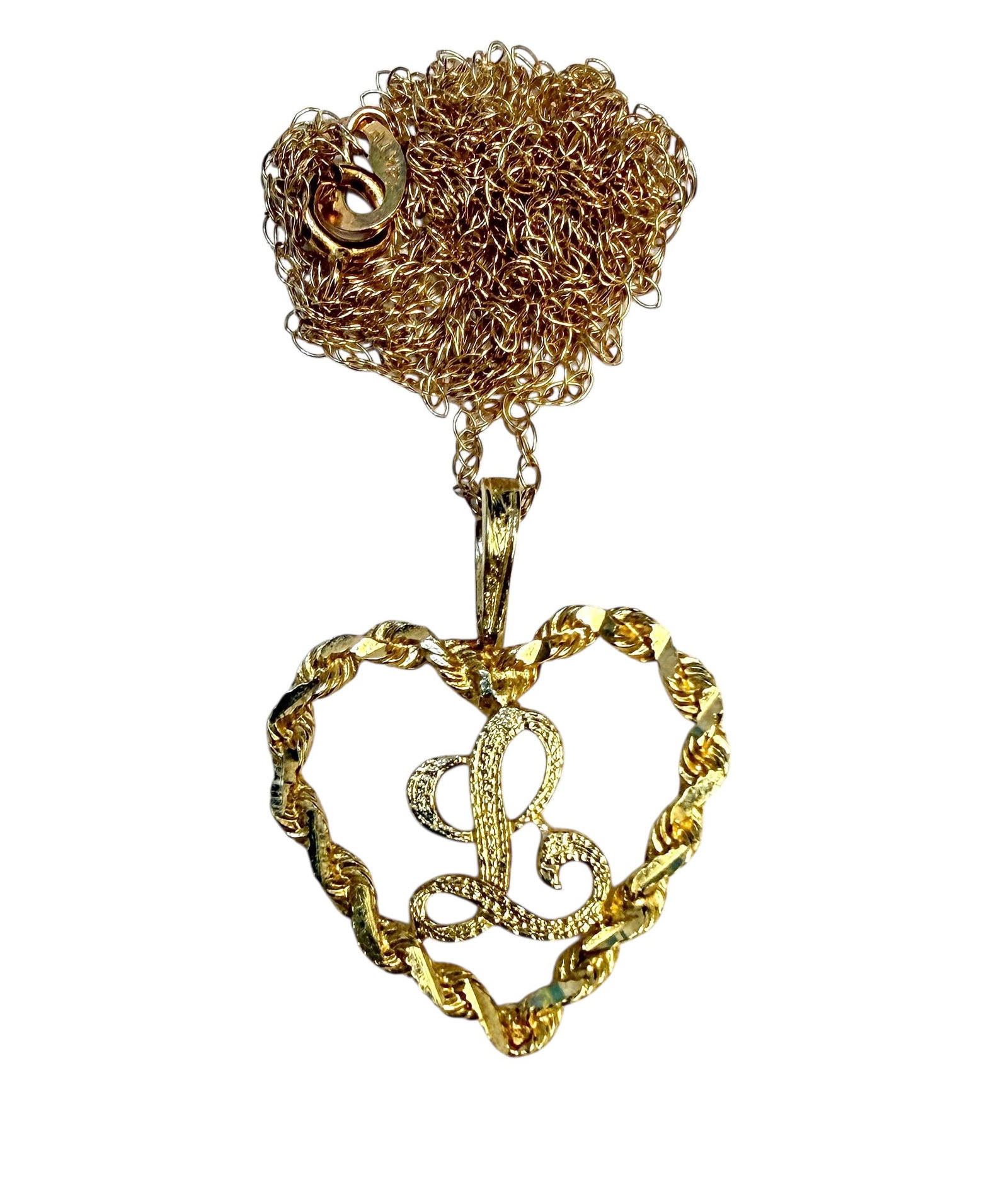 GOLD HEART PENDANT NECKLACE: 14K YELLOW GOLD CHAIN WITH L HEART-SHAPED PENDANT. CHAIN IS 18". 2 GRAMS TOTAL WEIGHT.