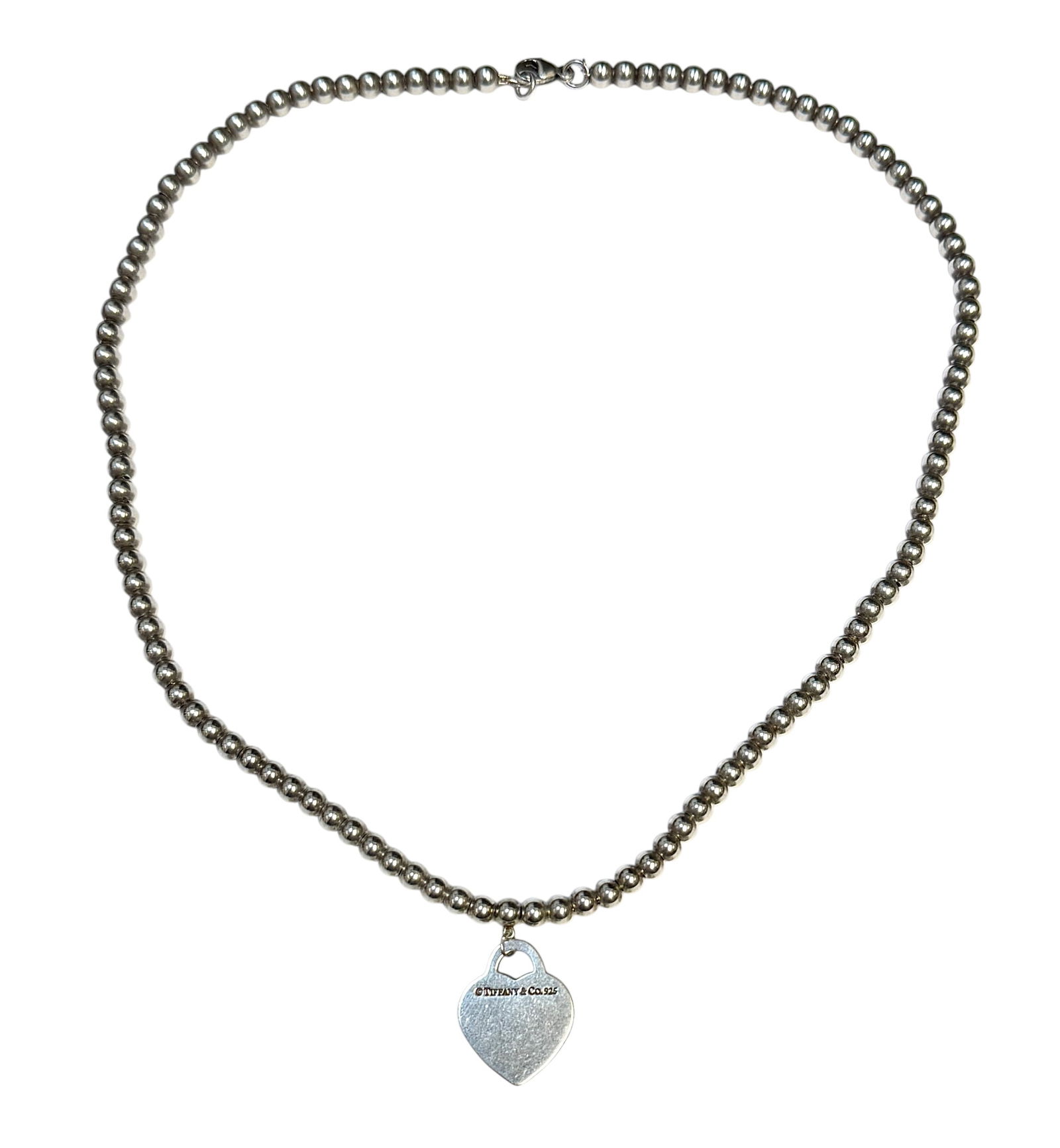 TIFFANY & CO. HEART PENDANT NECKLACE: STERLING SILVER, TIFFANY & CO., HEART PENDANT ON BEAD CHAIN. 13 GRAMS TOTAL WEIGHT, 16"