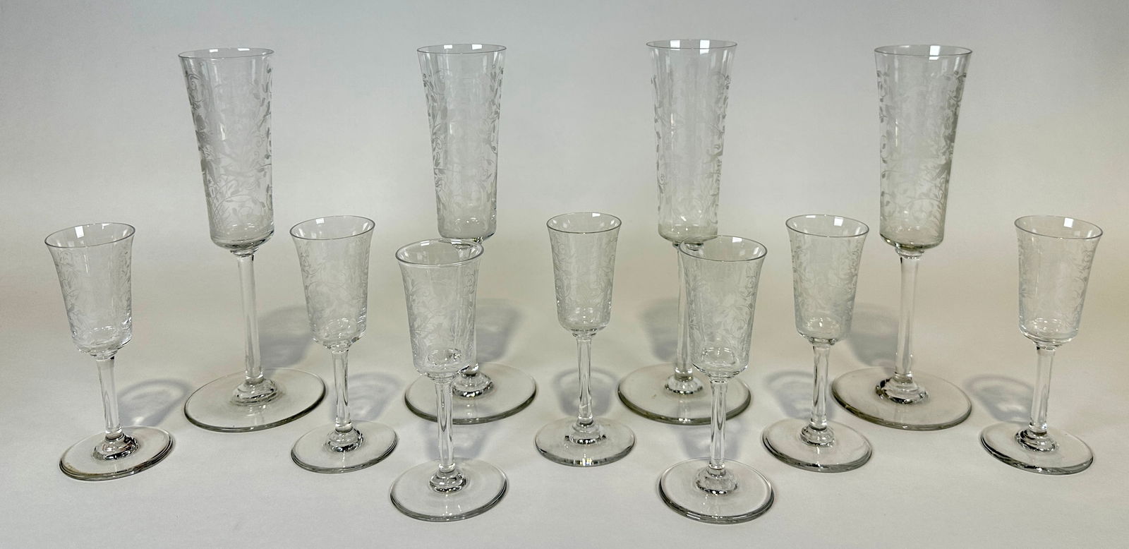 LEILLAH BY BACCARAT STEMWARE: CHAMPAGNE FLUTES AND CORDIALS. MARKED. 8.25"H, 4.75". NO FLAWS.