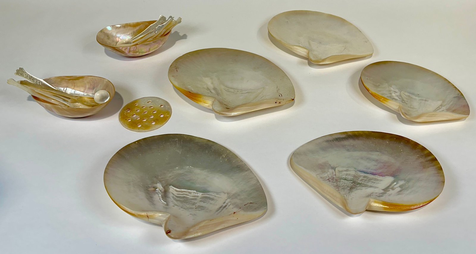 MOTHER OF PEARL CAVIER SERVING WARES: SERVING PLATES, BOWLS AND UTENSILS. SHELL PLATES ARE APPROX. 5"X8"