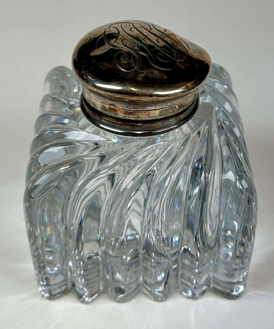 HEAVY PRESSED GLASS - STERLING SILVER INKWELL: FROM THE ESTATE OF GEORGE HOPPIER HUMPHREYS (1834-1899). PRESSED GLASS IN SWIRL DESIGN WITH STERLING SILVER HINGED TOP. TOP WITH DIMPLING. 3.75"H
