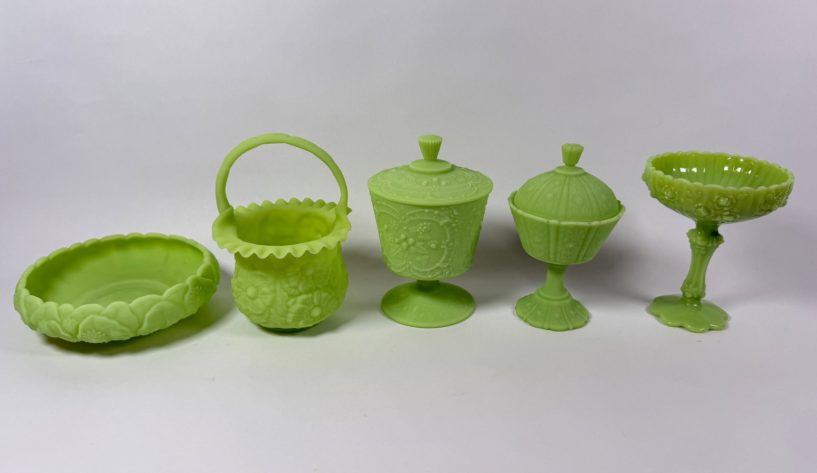 FENTON URANIUM LIME GREEN CUSTARD GLASS: VASELINE. FOUR OF FIVE MARKED FENTON. ALL IN VERY GOOD CONDITION, VERY MINOR SCATTERED STAINING WHICH MAY CLEAN.