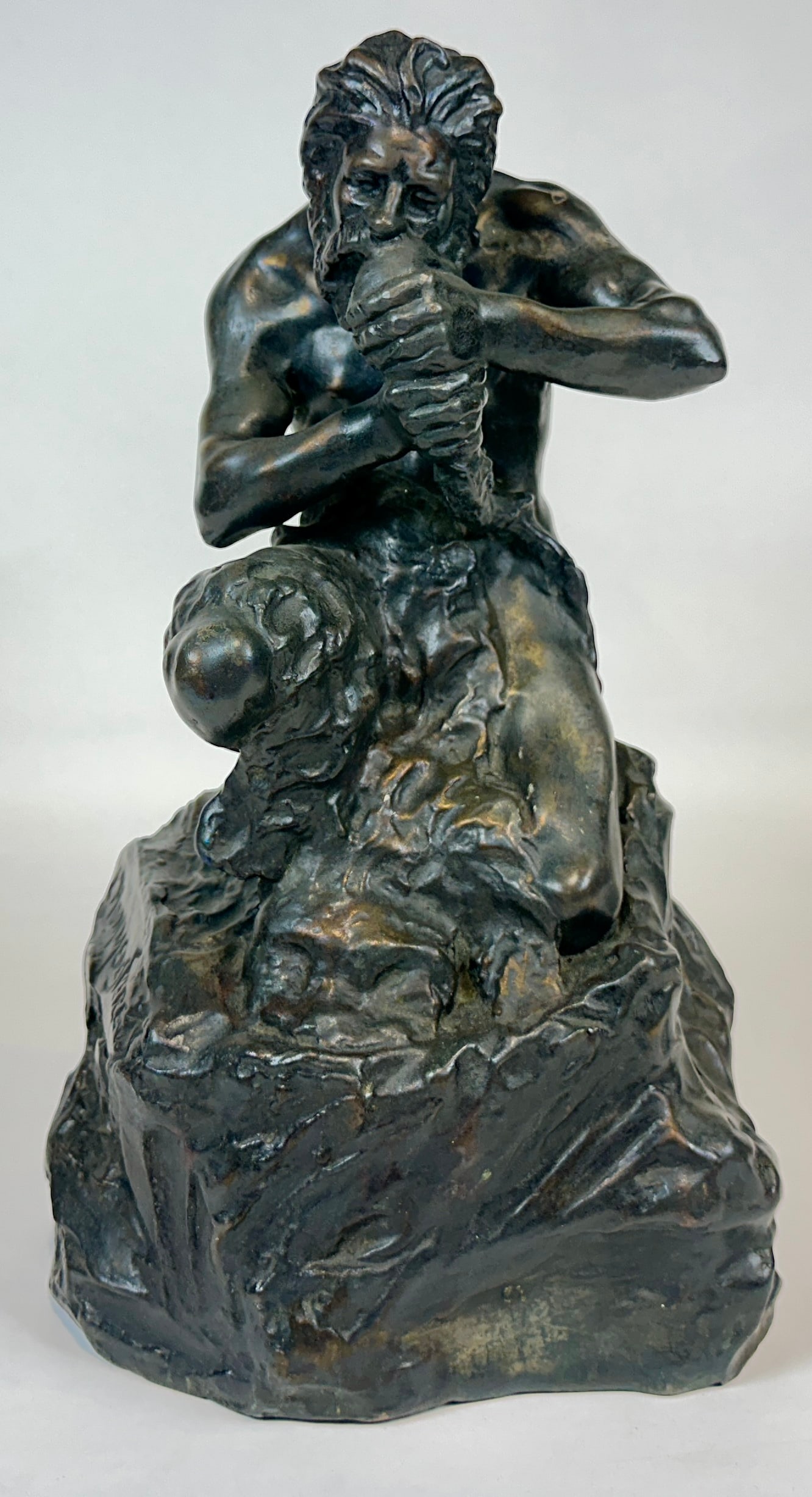 1901 L'HOMME DES FORETS BRONZE FIGURAL SCULPTURE: SEMI-NUDE MAN DRINKING FROM A HORN, SIGNED ILLEGIBLY, DATED 1901. 14"H