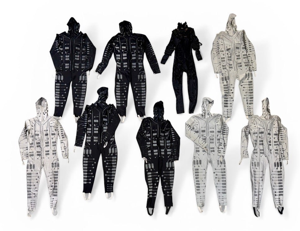 MOTION PICTURE POWER RANGERS MOVIE MEMORABILIA: INCLUDES A GROUPING OF MOTION PICTURE WARDROBE USED IN THE FILMING OF POWER RANGERS IN SPACE, SABAN ENTERTAINMENT, 1998. SERIES OF SPANDEX STYLE SPACE UNIFORMS AS WORN IN THE FILMING.