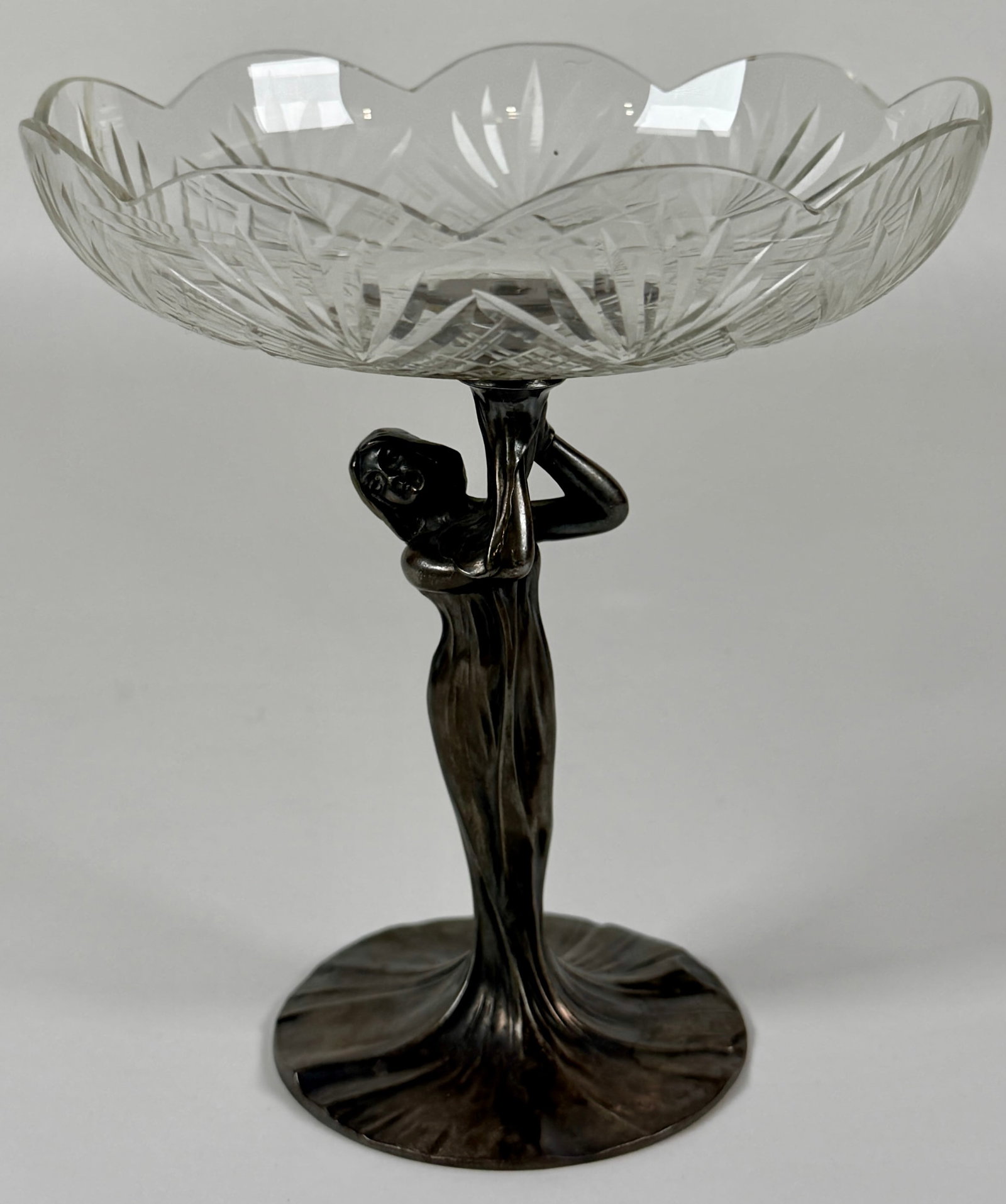 B. HENNEBERG ART NOUVEAU DISH: FIGURE OF A WOMAN METAL BASE WITH CUT GLASS DISH. MARKED B. HENNEBERG WARSZAWA. 6.5"H