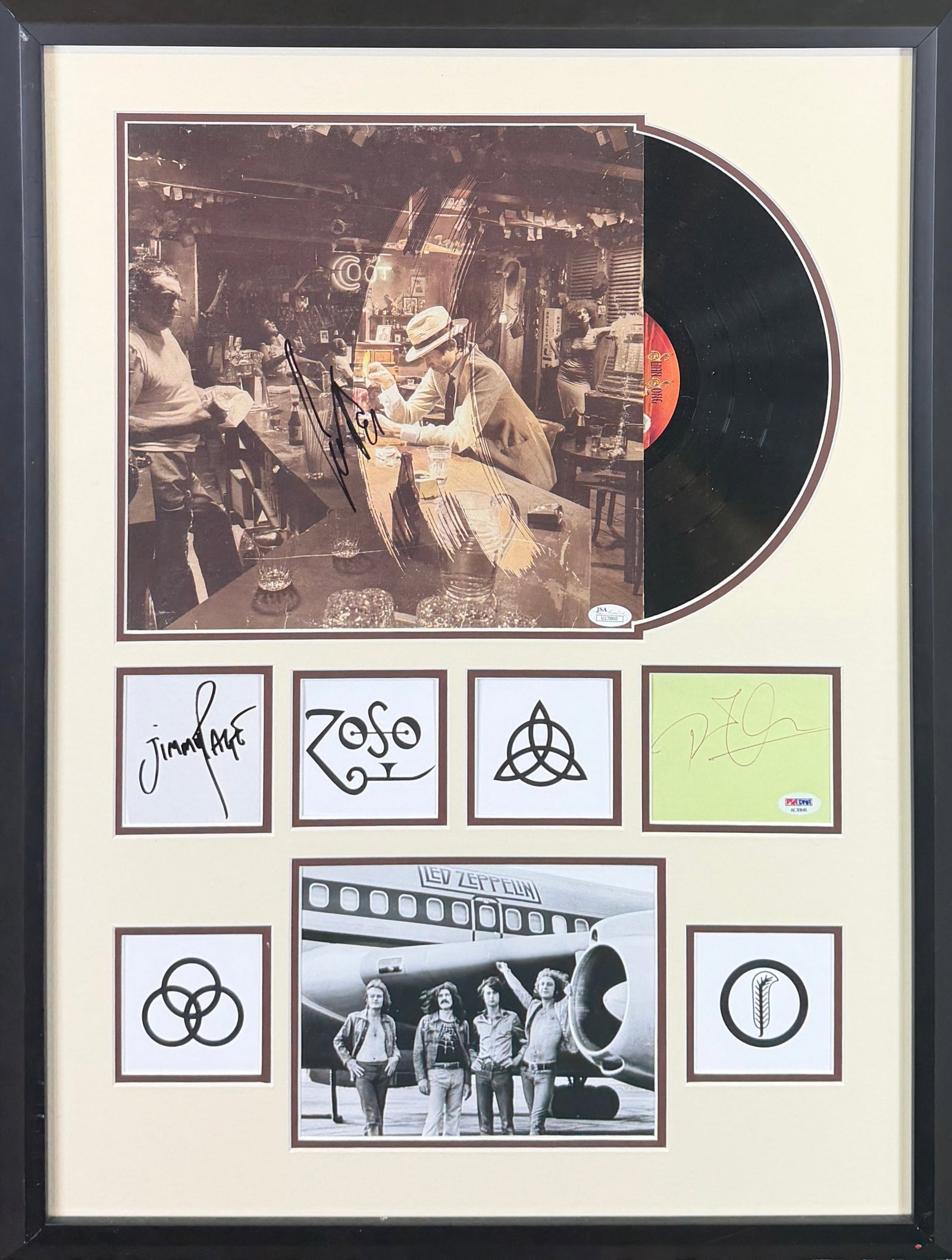 LED ZEPPLIN SIGNED MEMORABILIA: FRAMED MONTAGE OF LED ZEPPLIN AUTOGRAPHS INCLUDING JOHN PAUL JONES ALBUM (JSA CERT LABEL), JIMMY PAGE CUT (JSA CERT) AND ROBERT PLANT CUT (PSA CERT LABEL). PROFESSIONALLY FRAMED DISPLAY. 22"X29"