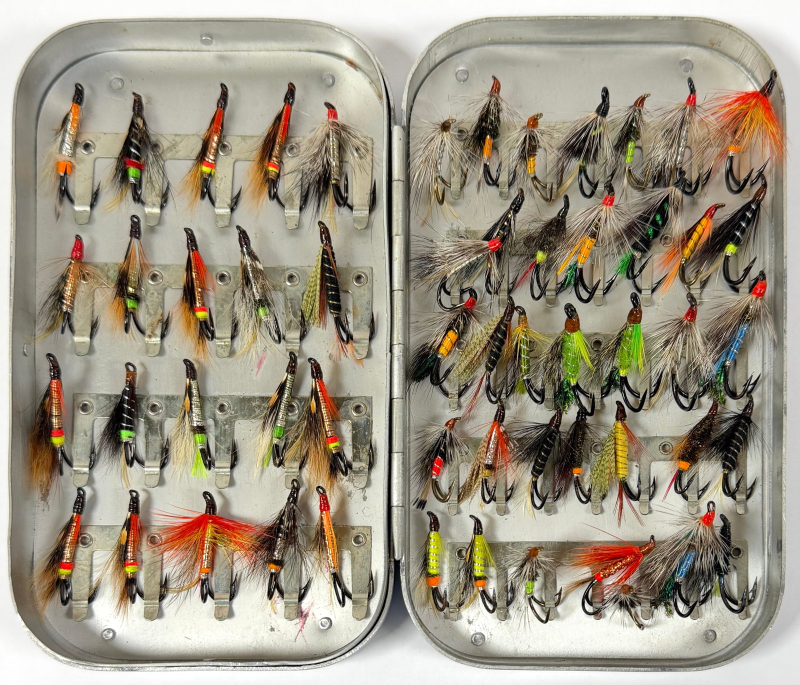 COLLECTION OF VINTAGE FLY FISHING LURES: FISHING FLIES IN WHEATLEY CASE. APPEAR TO BE UNUSED, APPROX. 50.