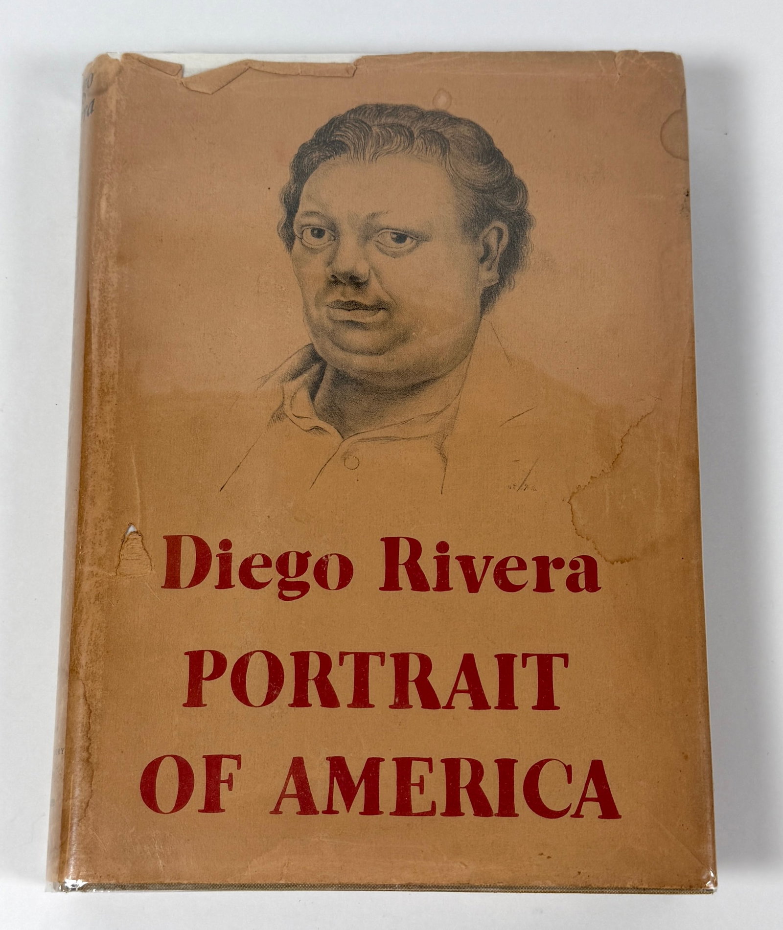 PORTRAIT OF AMERICA - DIEGO RIVERA: HARDCOVER WITH ORIGINAL WRAPPER, CONTAINS OVER 60 OF THE MORE THAN 70 MURALS HE PAINTED DURING HIS TIME IN THE U.S. COVICI, FRIEDE, INC., 1934.