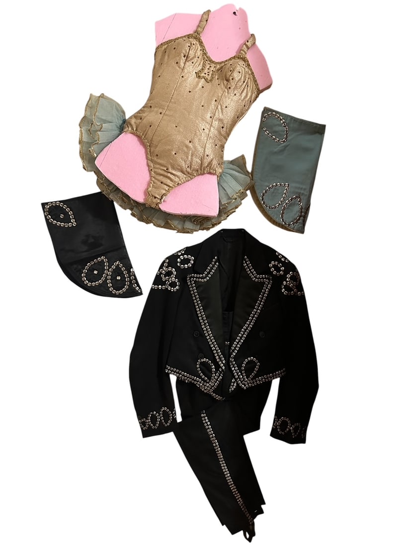 Beverly and Rudy Rudynoff Circus Wardrobe: Performance wardrobe as worn by the Rudynoffs in their equestrian acts. Includes his and hers, photograph of the act and copy of Hoofers! Dancing on a Sawdust Stage - The Story of the Rudynoff Family