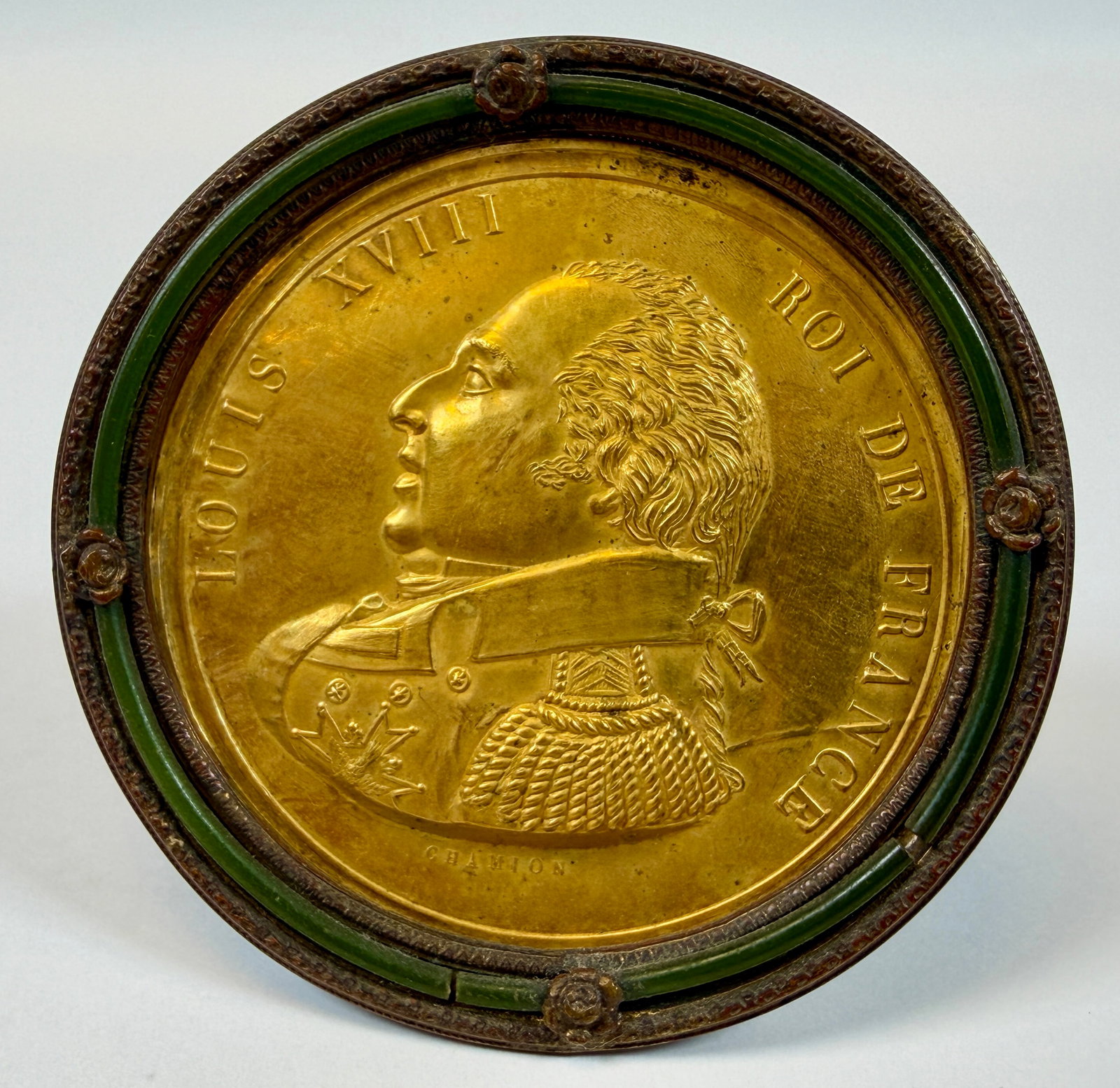 19TH C. GILDED BRASS PLAQUE OF LOUIS XVIII: LOUIS XVIII KING OF FRANCE. SMALL RELIEF PLAQUE MOUNTED IN DIMINUTIVE FRAME. SIGNED CHAMION. 3"