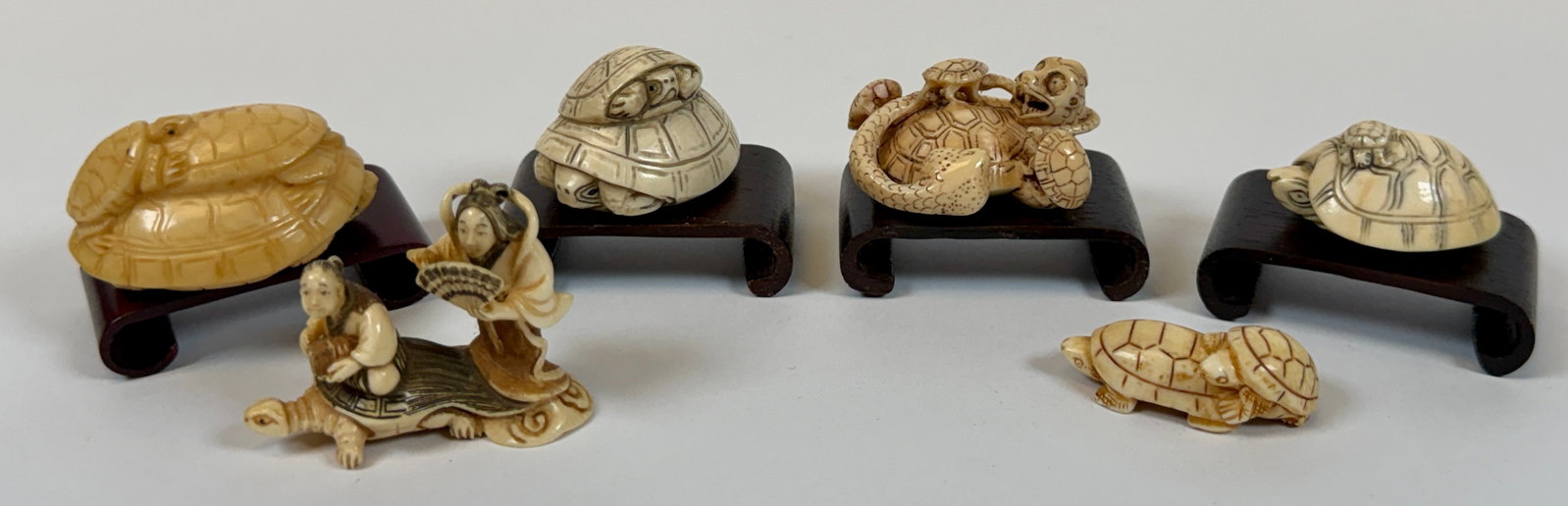 ORGANIC JAPANESE TURTLE NETSUKE COLLECTION: COLLECTION DEDICATED TO TURTLES. INCLUDES FOUR STANDS. MOST SIGNED.