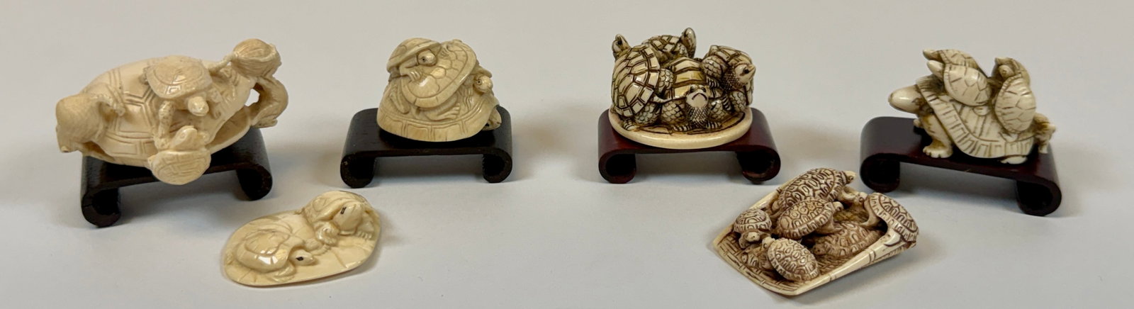 ORGANIC JAPANESE TURTLE NETSUKE COLLECTION: COLLECTION DEDICATED TO TURTLES. INCLUDES FIVE STANDS. MOST SIGNED.