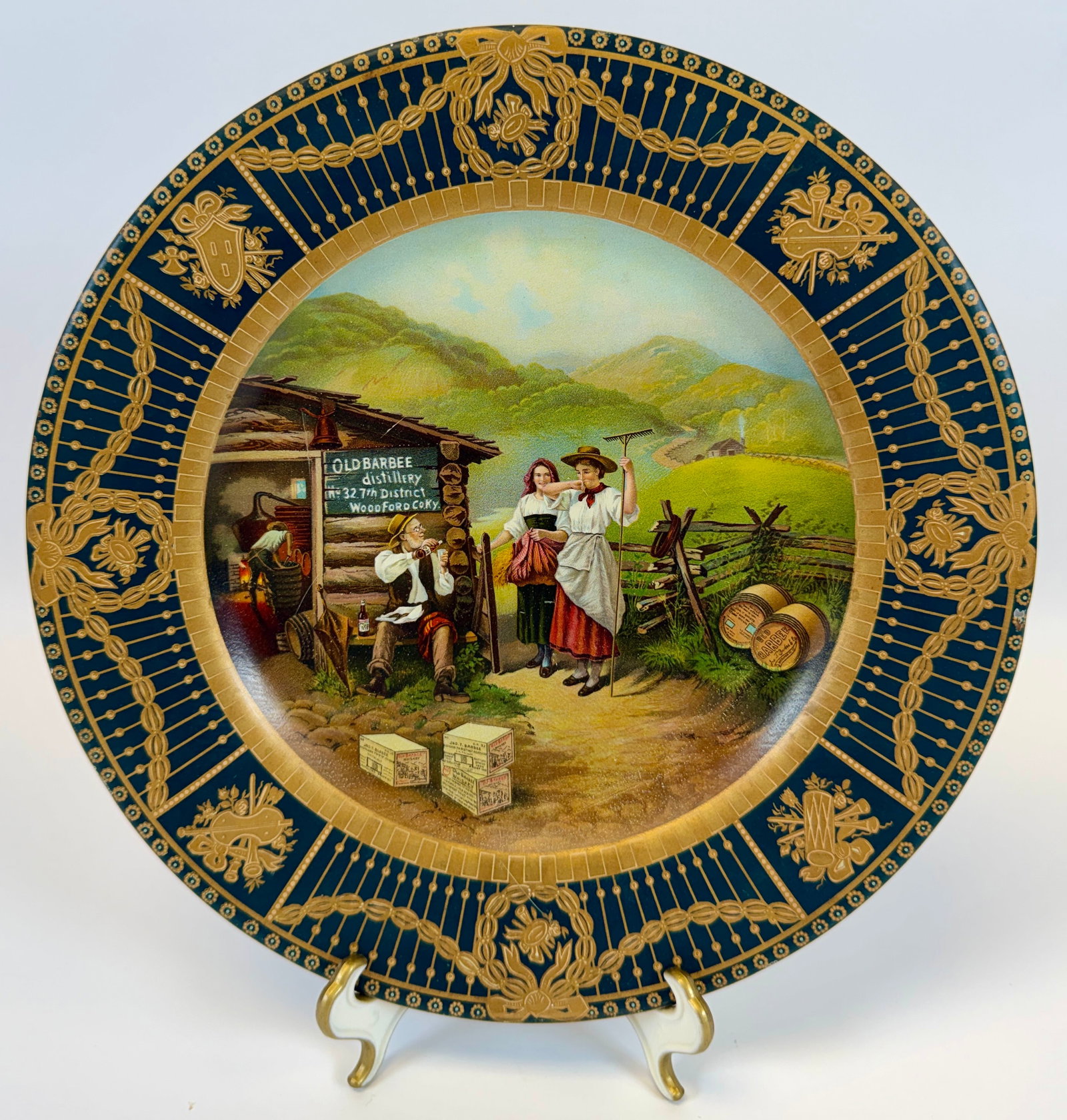 OLD BARBEE DISTILLERY VIENNA ART PLATE: ADVERTISING. LITHOGRAPHED TIN ART PLATE, BARBEE DISTILLERY, LOUISVILLE, KY, 1905. OBVERSE VERY GOOD, REVERSE WITH WEAR MARKS. 10".