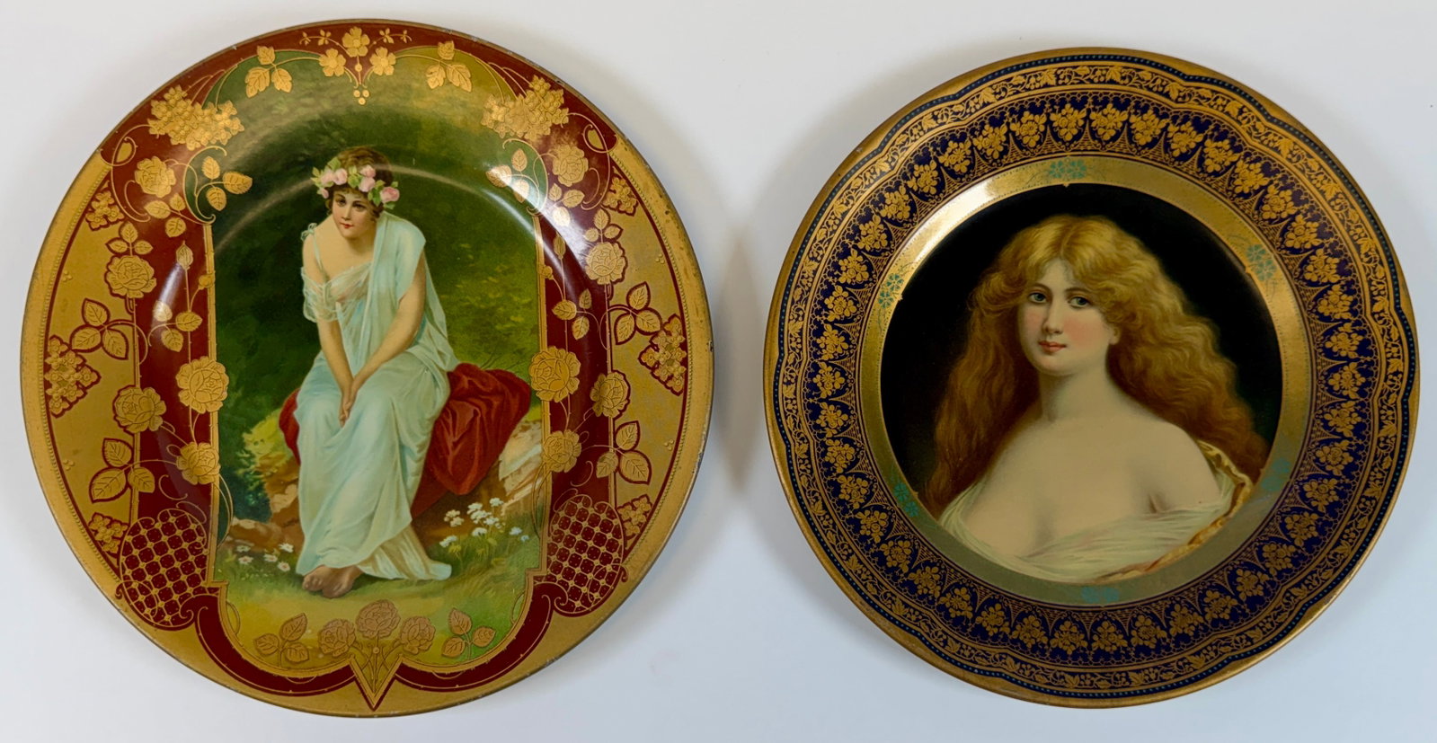 PAIR OF VIENNA ART PLATES: PAIR OF ANTIQUE VIENNA ART PLATES BEARING IMAGES OF WOMEN. OBVERSE VERY GOOD, REVERSE WITH WEAR MARKS. LARGEST 10".