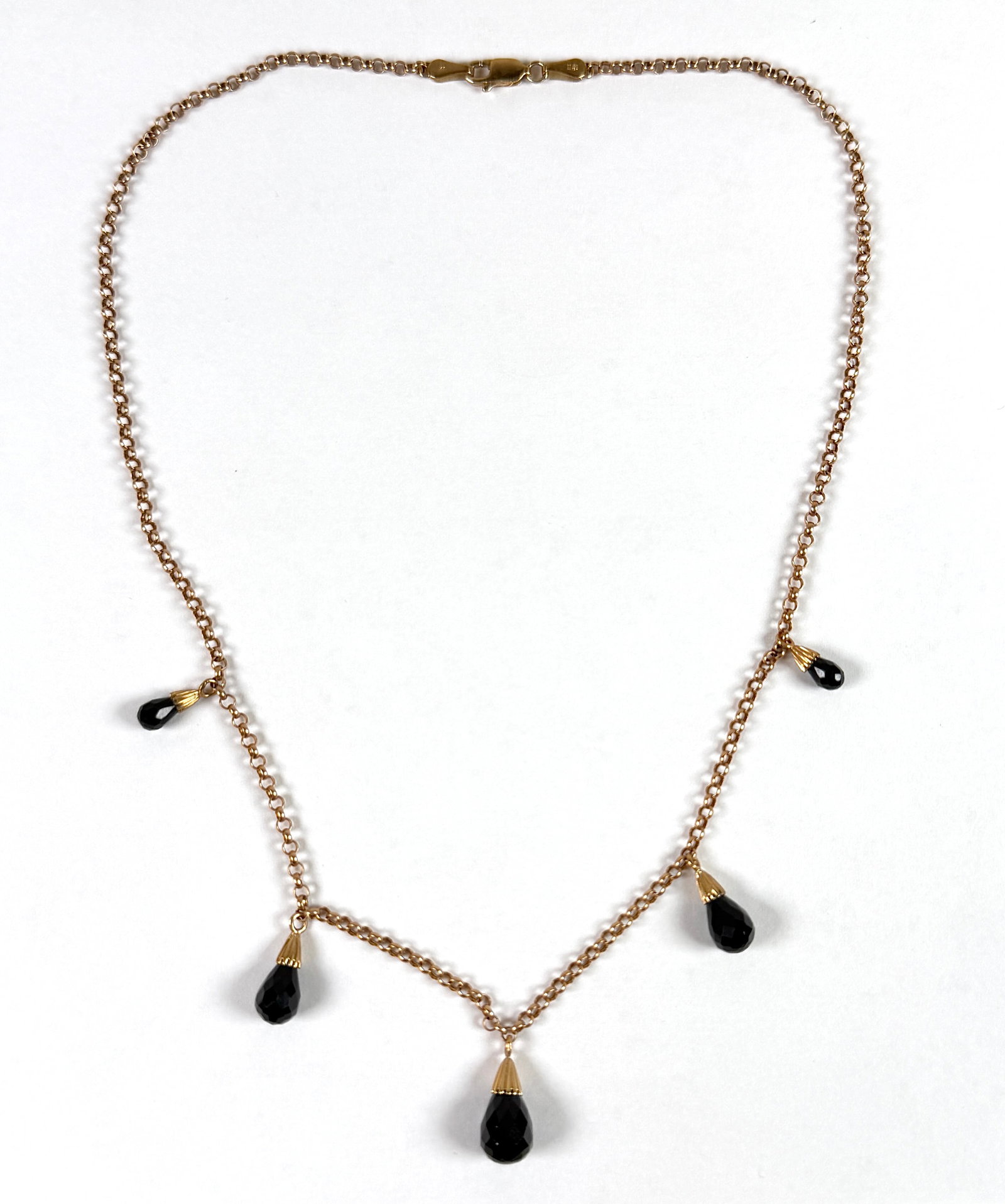 14K GOLD NECKLACE: GOLD WITH EBONY ACCENTS. 5.1 GRAMS. 16"