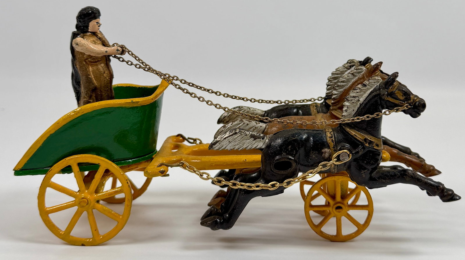 STANLEY CAST IRON CHARIOT TOY: CAST IRON STANLEY (ATTR.) TOY CHARIOT WITH HORSES, DRIVER. UNMARKED. PARTIAL REPAINT. 10.5"