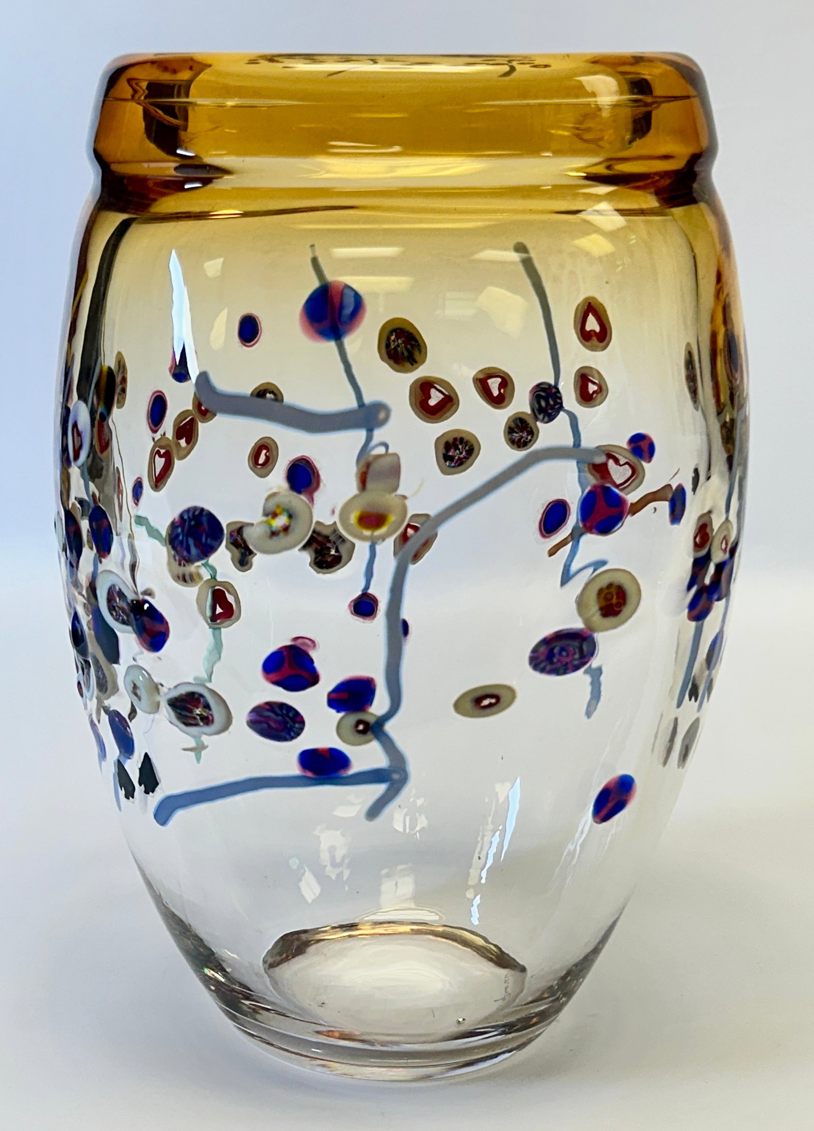 PINO SIGNORETTO MURANO ART GLASS VASE: SIGNED. RADIANT AMBER COLOR, MURRINE AND CANE DESIGN. 12"H. CONDITION REPORT AVAILABLE ON REQUEST. CANNOT ISSUE REPORTS WHILE AUCTION IS IN PROGRESS.