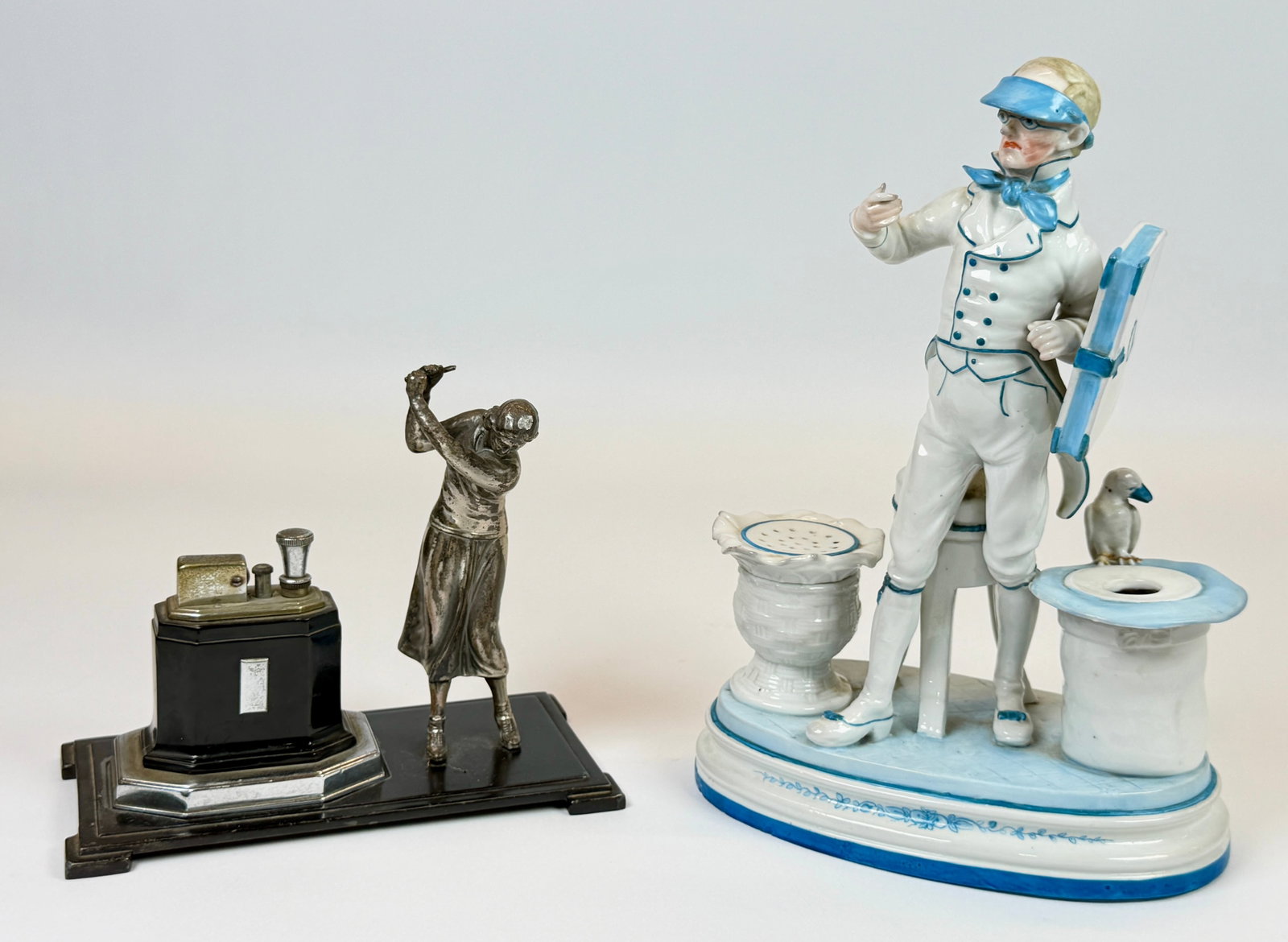 FIGURAL INKWELL AND LIGHTER: KPM FIGURAL PORCELAIN FIGURAL INKWELL. RONSON GOLF FIGURAL LIGHTER. GOLFER MISSING CLUB. INKWELL IS 10.5"