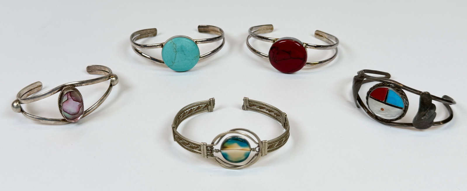 GROUPING OF ALPACA CUFF BRACELETS: SEE TITLE