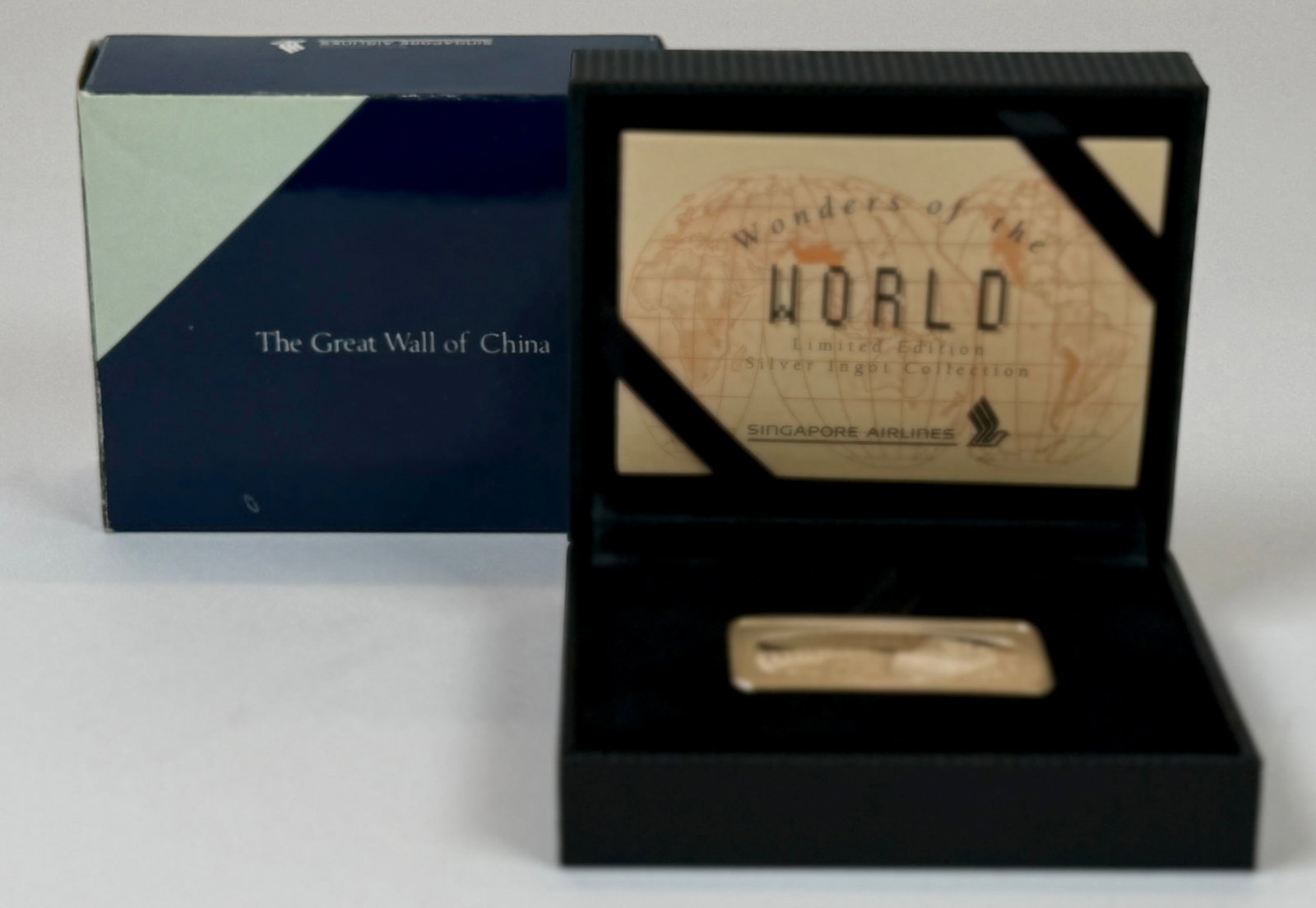 WONDERS OF THE WORLD SILVER INGOT: ONE OUNCE SILVER INGOT ISSUED BY SINGAPORE AIRLINE COMMEMORATING WONDERS OF THE WORLD, THE GREAT WALL OF CHINA.