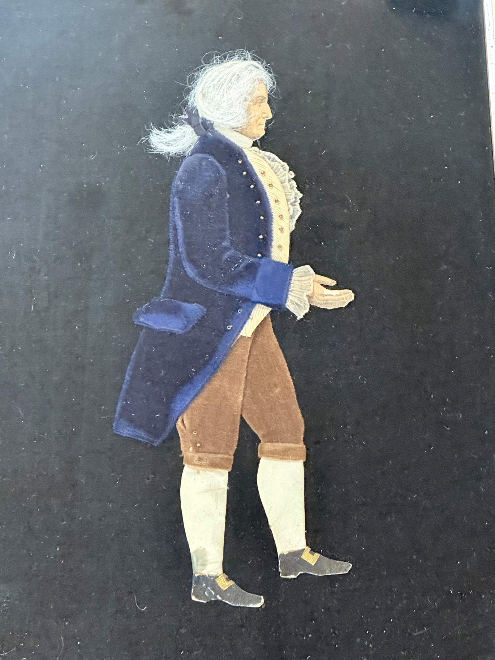 ANTIQUE FRAMED MIXED MEDIA DEPICTION OF WASHINGTON: MIXED MEDIA INCLUDING HAIR, PAPER, TEXTILES USED FOR CREATING AN IMAGE OF GEORGE WASHINGTON. FRAMED. LABEL ON VERSO READS: "MADE BY BY GREAT AUNT PATRICIA HOPKINS." RICHARD YEAKEL ANTIQUES LABEL ON FR