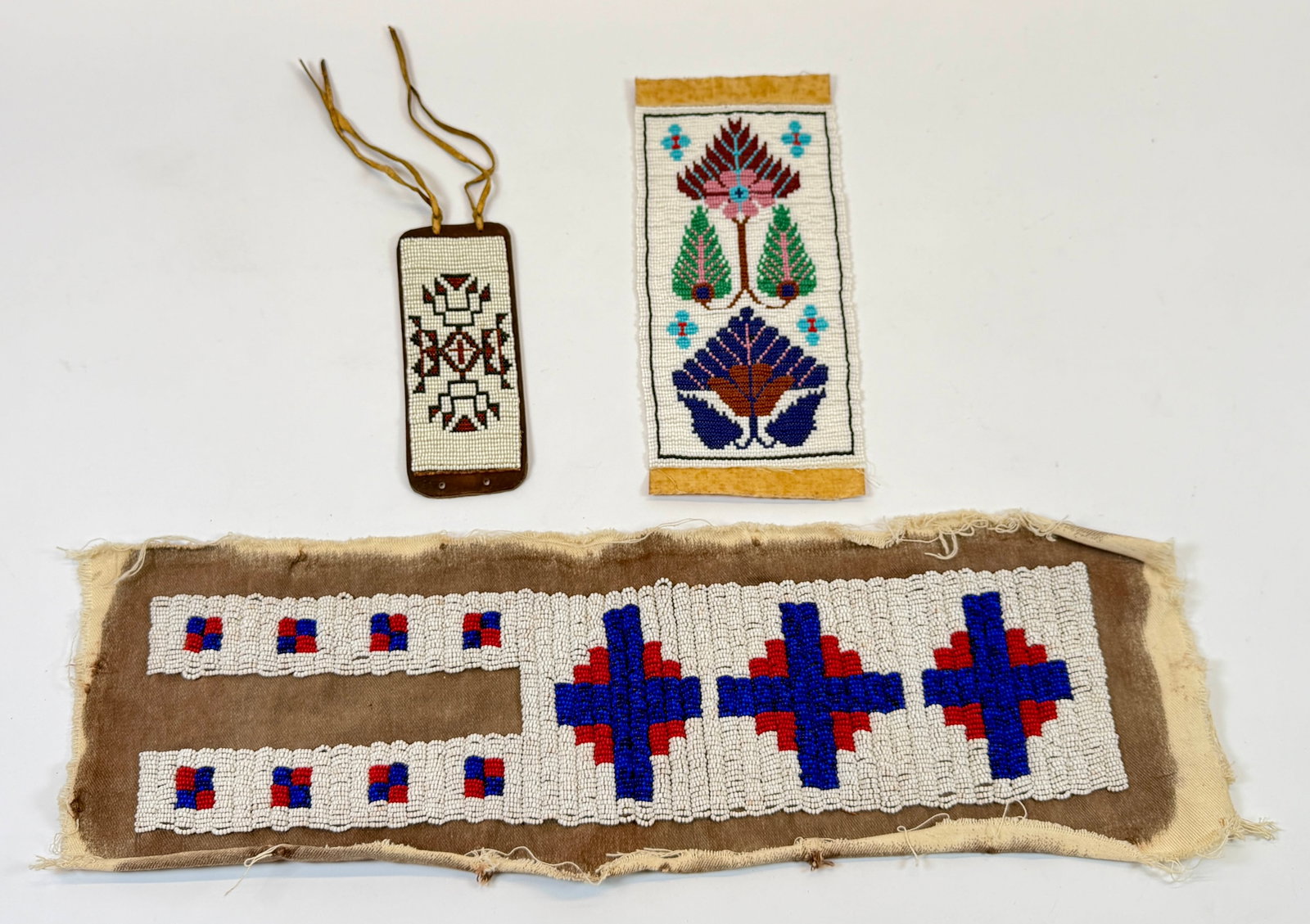 NATIVE AMERICAN BEADWORK COLLECTION: ARM BAND PLUS TWO PANELS, SAUK FOX AND OTHERS. LARGEST PANEL IS 7"X22"