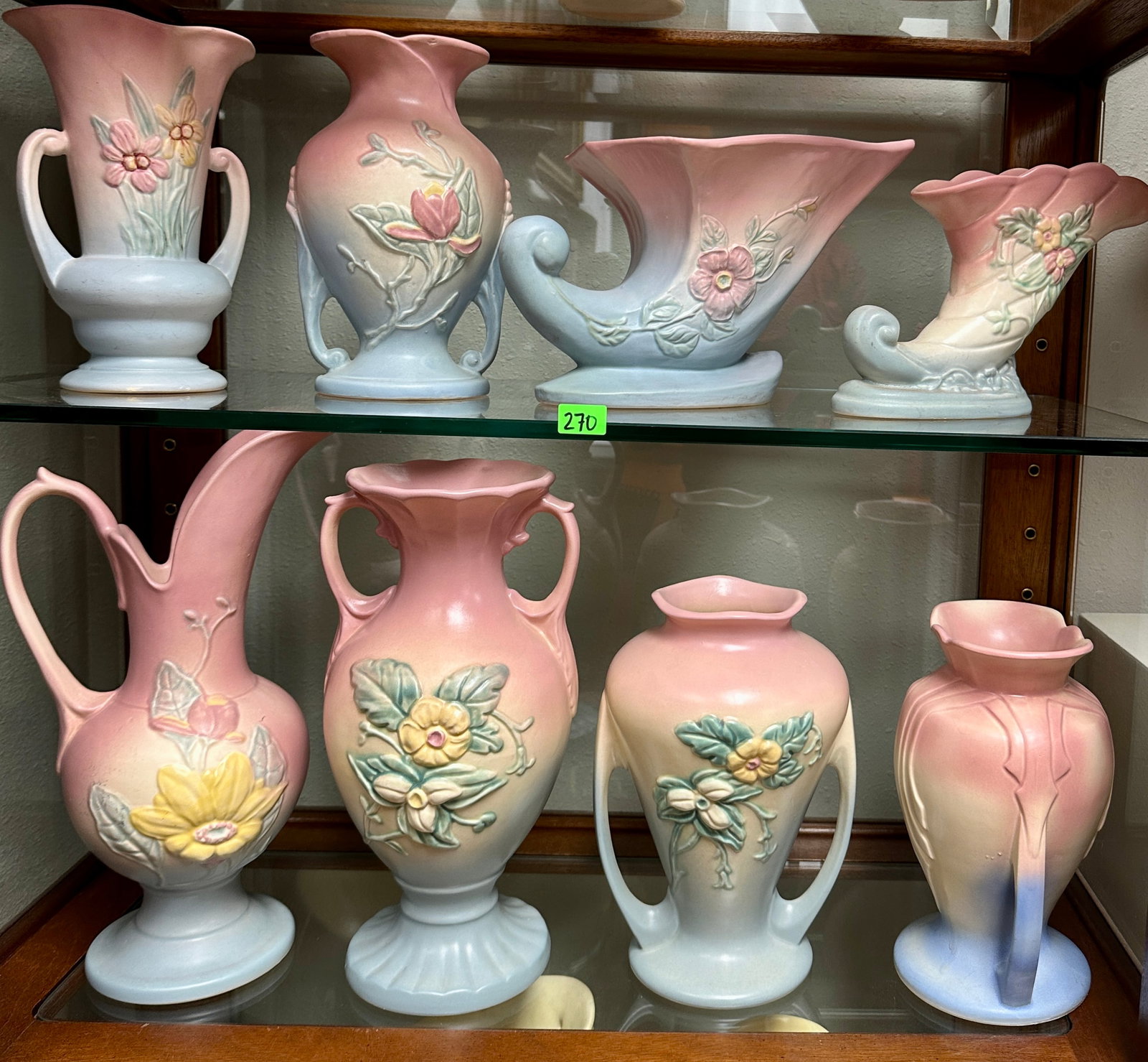 COLLECTION OF VINTAGE HULL POTTERY: LOT OF EIGHT. TALLEST IS 13". REQUIRES THIRD PARTY SHIPPING.