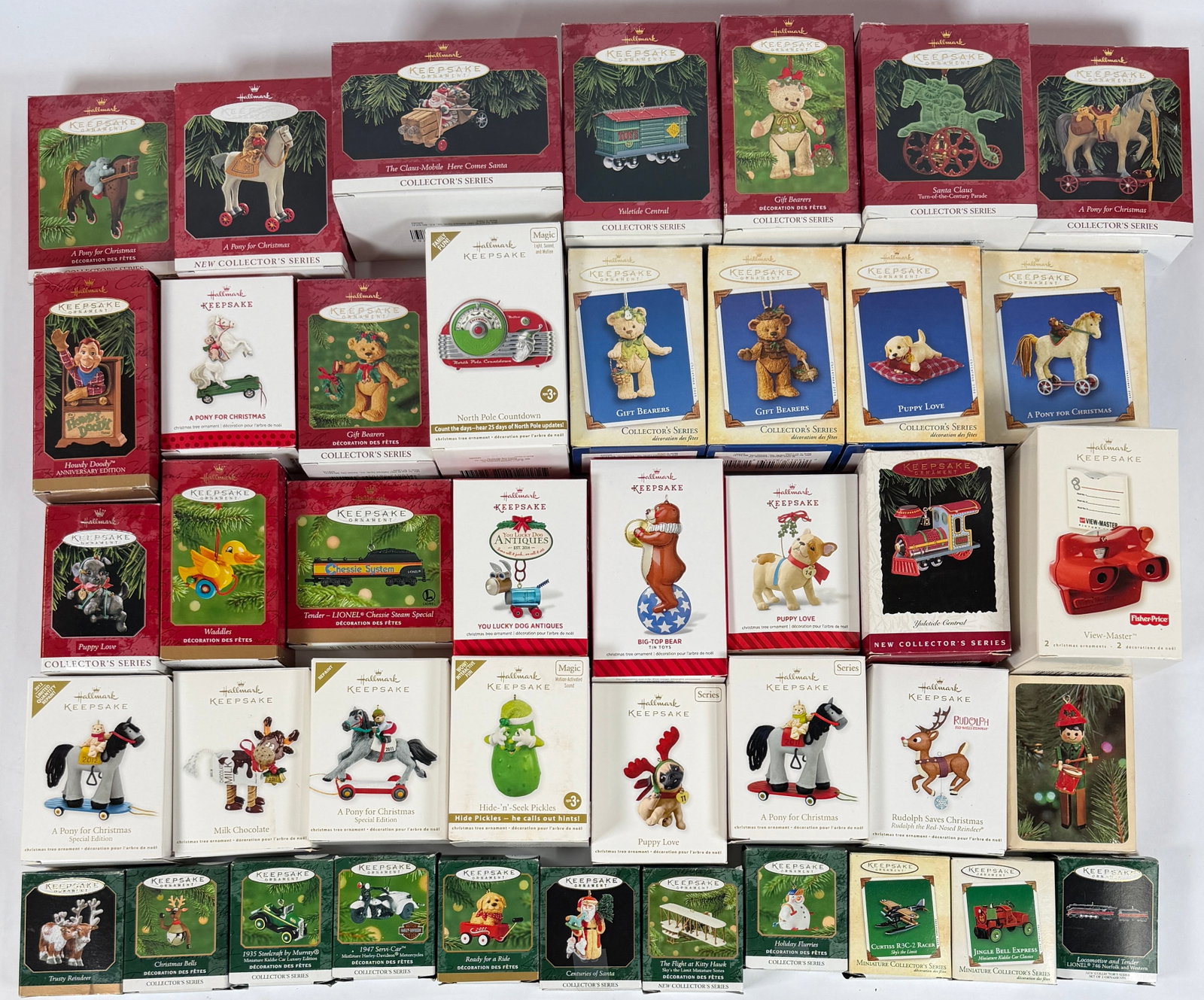 EXTENSIVE COLLECTION OF HALLMARK KEEPSAKE ORNAMENTS: ORIGINAL BOXES. APPROX. 50 PIECES.