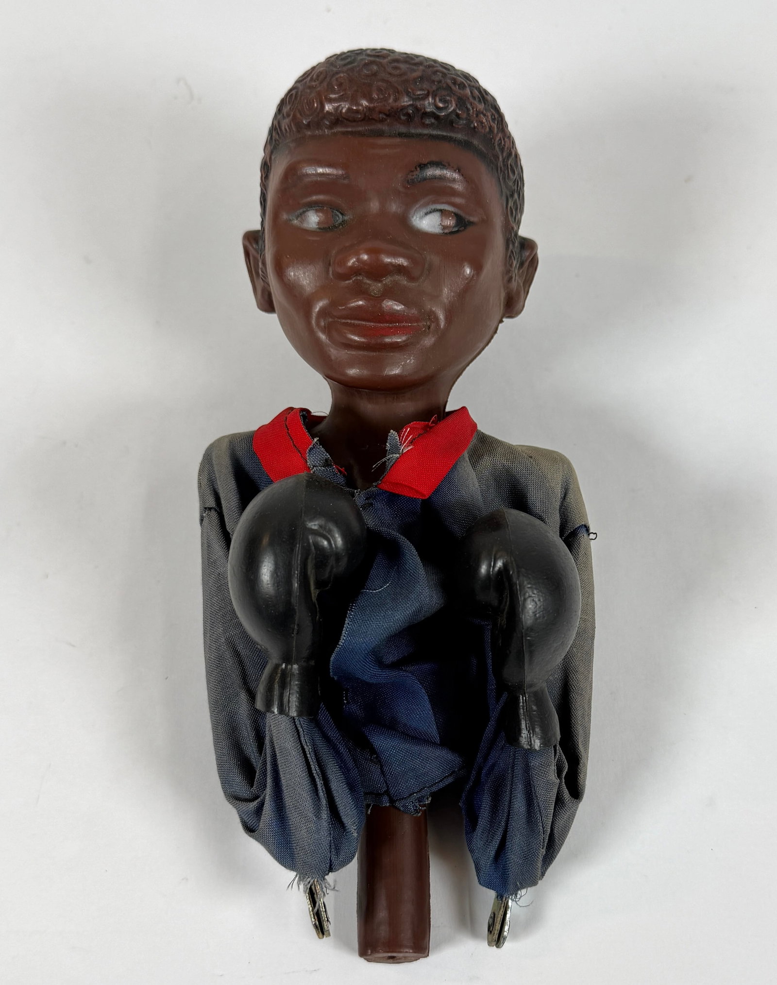 1960'S BOXING PUPPET: HAVING A PAIR OF FINGER ACTUATED LEVERS THAT SIMULATE REALISTIC PUNCHES. UNMARKED.