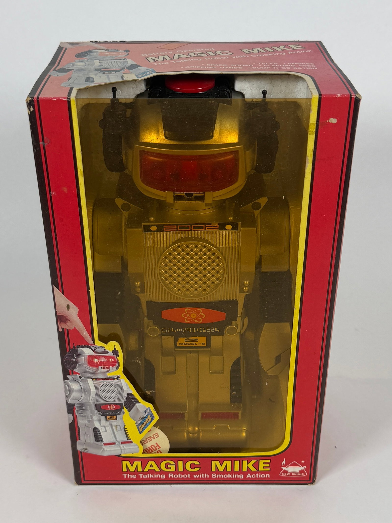 MAGIC MIKE - TALKING ROBOT WITH SMOKING ACTION: BATTERY OPERATED. BUMP-N-GO ACTION, SMOKING, FLASHING EYES, TALKING SPACE SOUND, GRIPPING HANDS. CARTON IS 11"X7"X5"