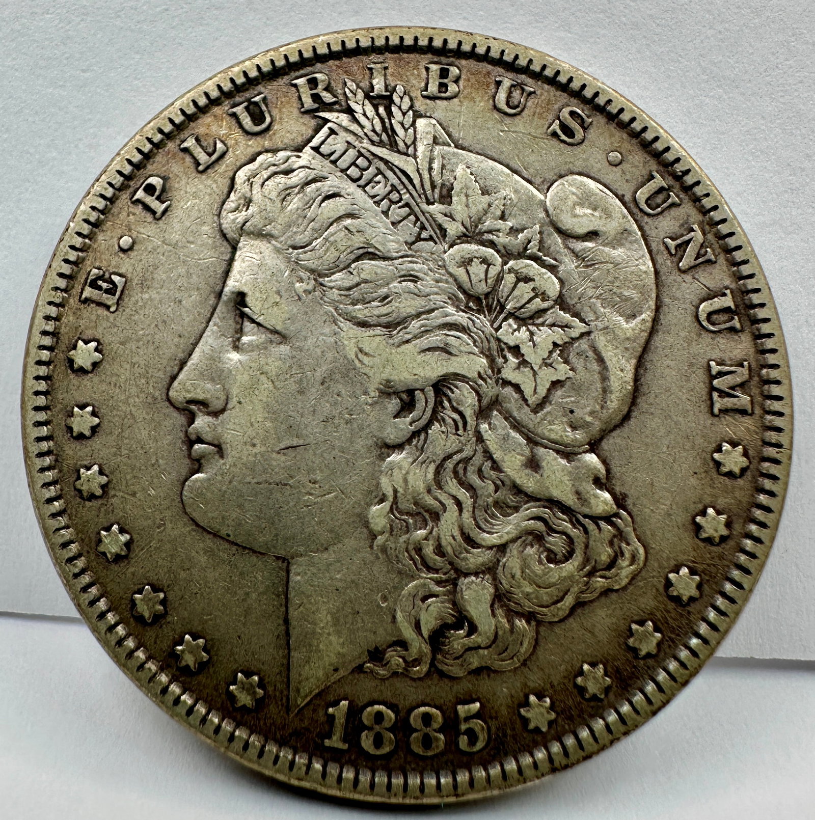 1885 MORGAN SILVER DOLLAR: CIRCULATED