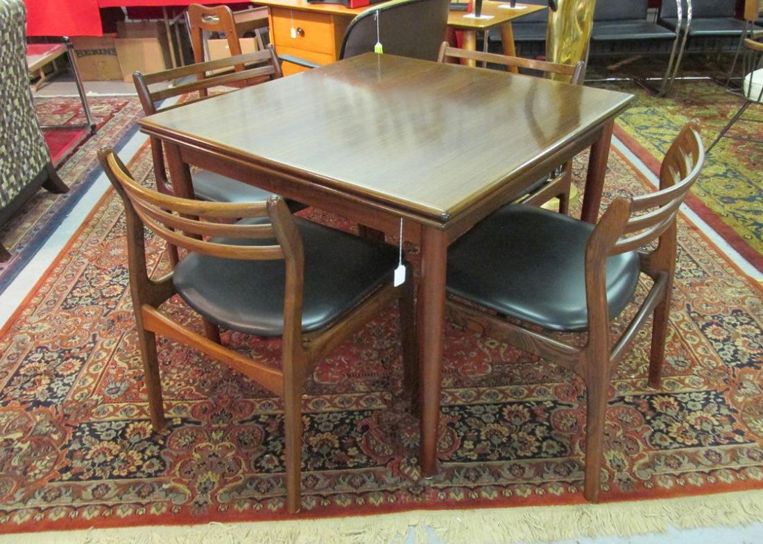 DANISH ROSEWOOD DINING TABLE AND 4 CHAIRS: TABLE SIGNED EU. CHAIRS ARE DESIGNED BY P.E. JORGENSEN