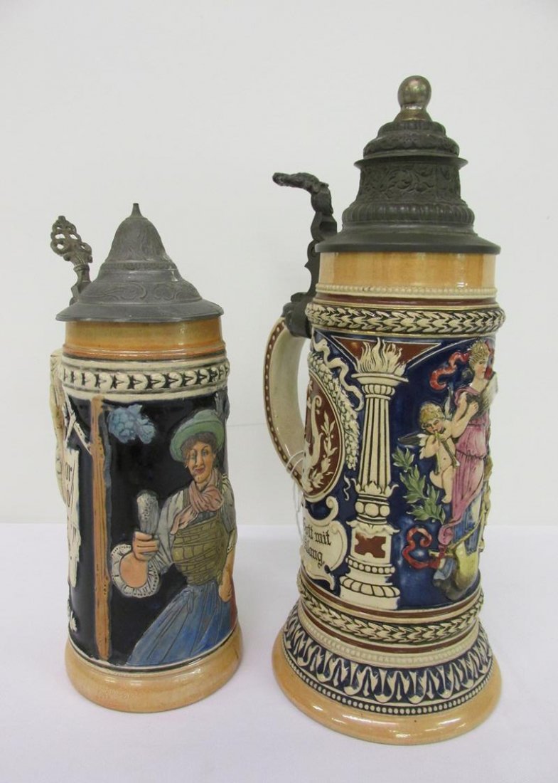 PAIR OF EARLY 1900'S GERMAN LIDDED STEINS (1 of 2)