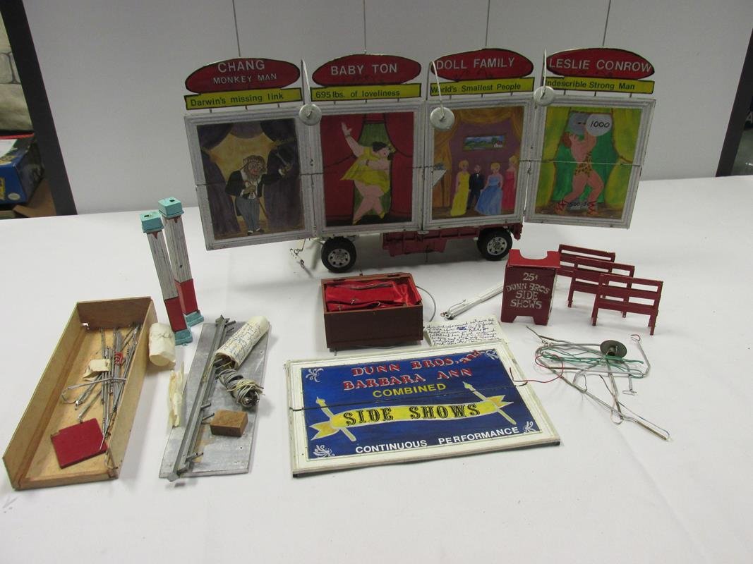 HAROLD DUNN, DUNN BROS. CIRCUS SIDESHOW WAGON #115: FROM THE ROBERT MACDOUGALL COLLECTION. THIS FINELY DETAILED 1/2" SCALE MODEL OF THE DUNN BROS. CIRCUS REPRESENT DIFFERENT ACTS INCLUDING CHANG, BABY TON, DOLL FAMILY AND LESLIE CONROW. RARE CHANCE TO