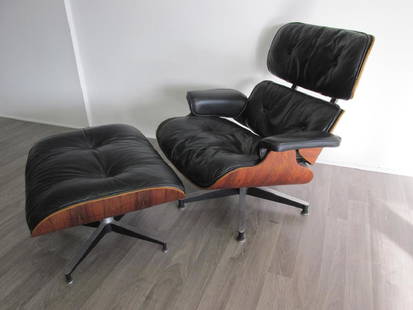 CHARLES & RAY EAMES FOR HERMAN MILLER ROSEWOOD/LEATHER: LEATHER IS PLYABLE, TOP SURFACE WORN IN SEAT BUT NOT CRACKED, WEAR CONSISTENT WITH AGE