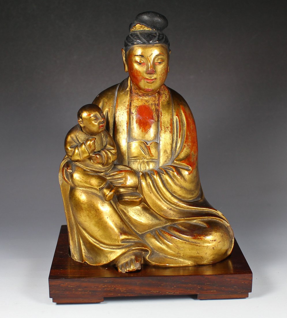 A Ming Dynasty Copper Carved Guanyin Figure (1 of 8)