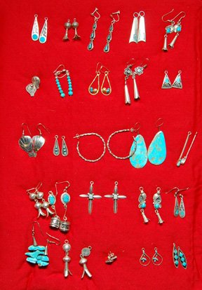 TWENTY-FOUR PAIR OF EARRINGS