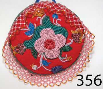 IROQUOIS PIN CUSHION: ca. 1ST Q 20TH CENT. floral beaded, edge beads, strap for wearing on wrist, 5.5" dia.