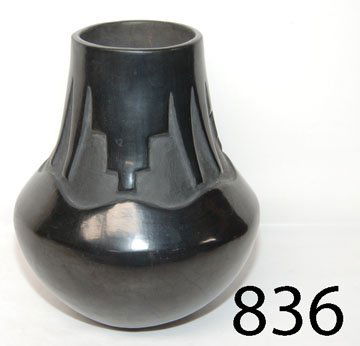 SAN ILDEFONSO POTTERY JAR: ca. 2ND Q 20TH CENT. carved geometric design, black ware, signed Juanita Wo-peen, 9.5" x 8".