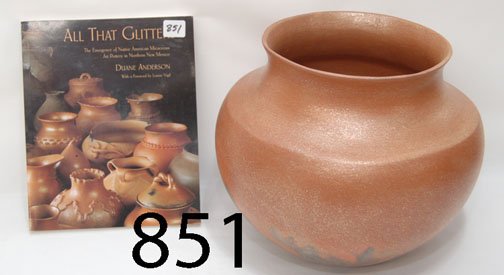 JICARILA APACHE/HISPANIC POTTERY JAR: ca. LAST Q 20TH CENT. polished micacous, with book "All That Glitters", artist listed and photographed on page 74, Felipe Ortega signed, 9.75" x 11".