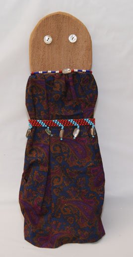 POMO/MIWOK DOLL: 1990'S made of slab pine, button eyes, male figure by Lucy Parker, 16" tall Shipping charge on this item is $10.00. Unless noted all items have some amount