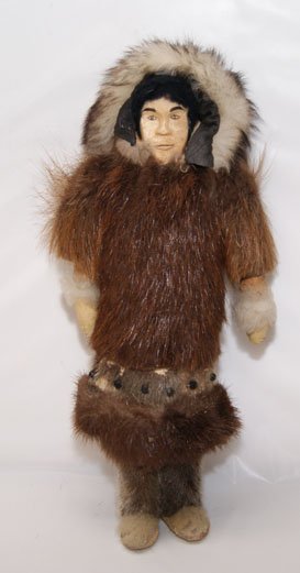 ESKIMO DOLL BY JULIE CARTER: 1985 carved wood face, 15" tall Shipping charge on this item is $15.00. Unless noted all items have some amount of acceptable wear, scratches, nicks, missin