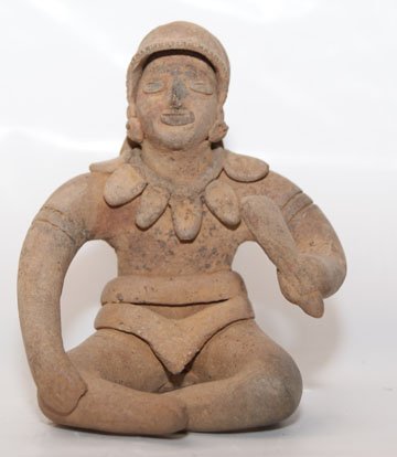 COLIMA POTTERY FIGURE: 100 AD seated figure holding fan, as found condition, ex Hubert Guy collection, 3.5" tall Shipping charge on this item is $10.00. Unless noted all items hav