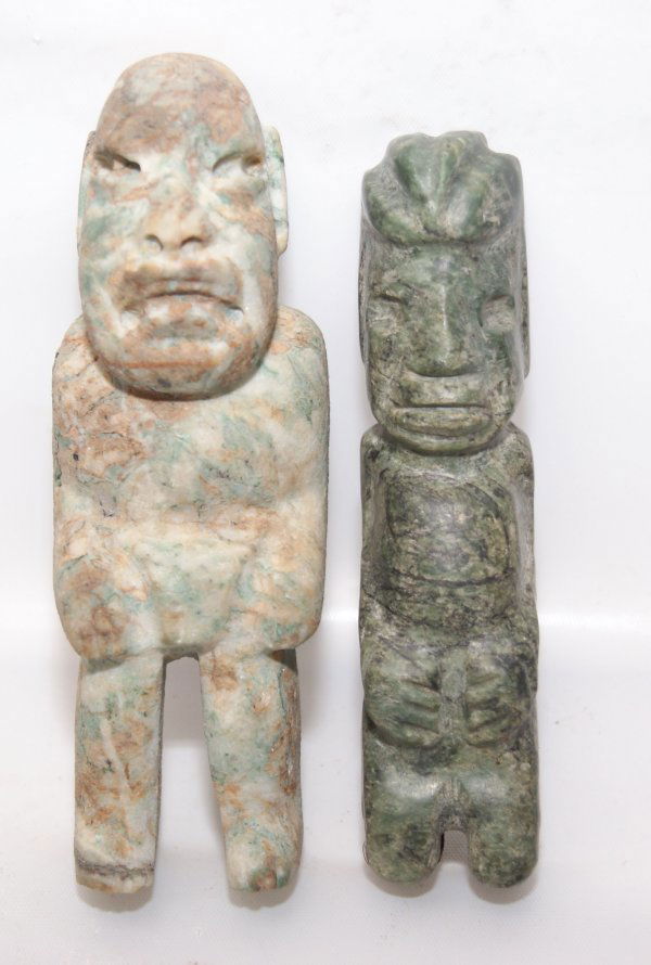 TWO PRECOLUMBIAN STONE IDOLS: hand carved human figures, as found, 4" tallShipping charge on this item is $10.00.Unless noted all items have some amount of acceptable wear, scratches, nicks, missing stitches, ect. for their age. M