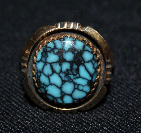 ZUNI GOLD RING: 1970'S 14k & turquoise, size 7.25Shipping charge on this item is $10.00.Unless noted all items have some amount of acceptable wear, scratches, nicks, missing stitches, ect. for their age. Measurements