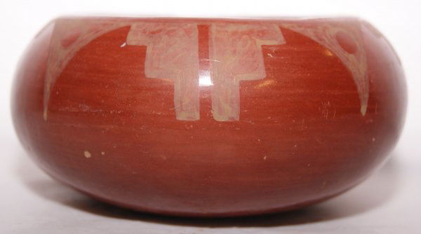 SAN ILDEFONSO POTTERY BOWL: 1960'S matte on red design, signed Marie, 2.5" x 4.75"Shipping charge on this item is $10.00.Unless noted all items have some amount of acceptable wear, scratches, nicks, missing stitches, ect. for th