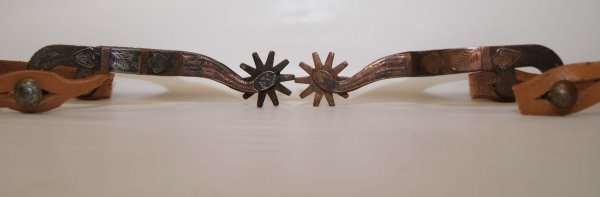 Western spurs: 1960's 2 singles, with copper & silver overlay, 5.5" x 3" Shipping charge on this item is $10.00. Unless noted all items have some amount of acceptable wear, scratches, nicks, missing stitches, ect. f