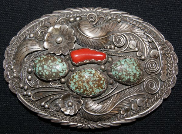 Navajo silver belt buckle: 1960s three turquoise stone one coral signed Jerry Francisco 3" x 4.5" Shipping charge on this item is $10.00. Unless noted all items have some amount of ac
