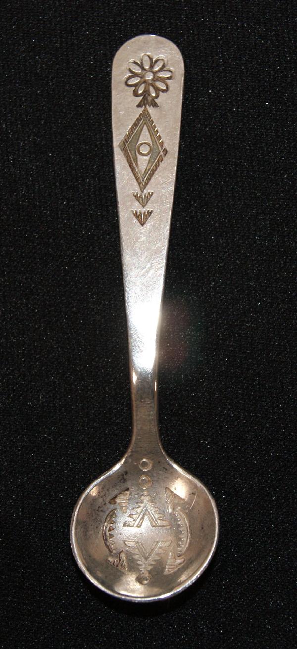 1940'S SAN ILDEFONSO SILVER SPOON: stamped design, signed Awatsira, 2.75" x .5"Shipping charge on this item is $10.00.Unless noted all items have some amount of acceptable wear, scratches, nicks, missing stitches, ect. for their age. M